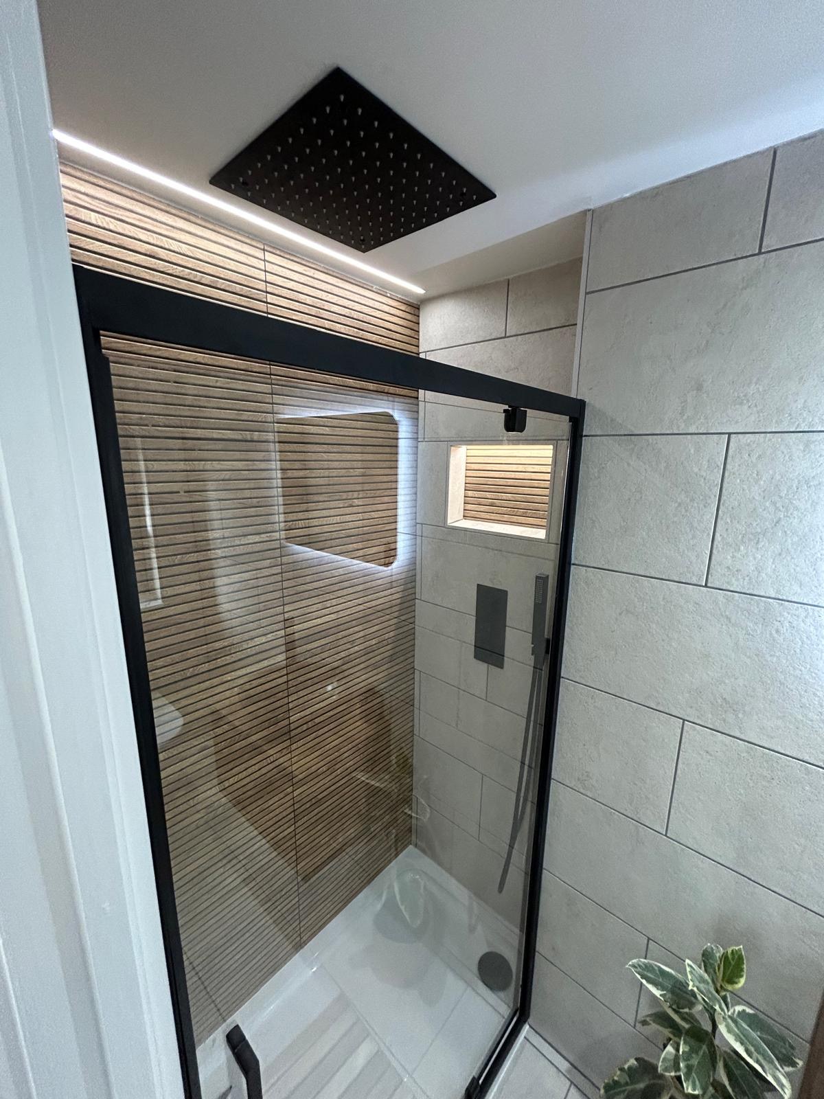 Slatted oak and black-framed shower enclosure