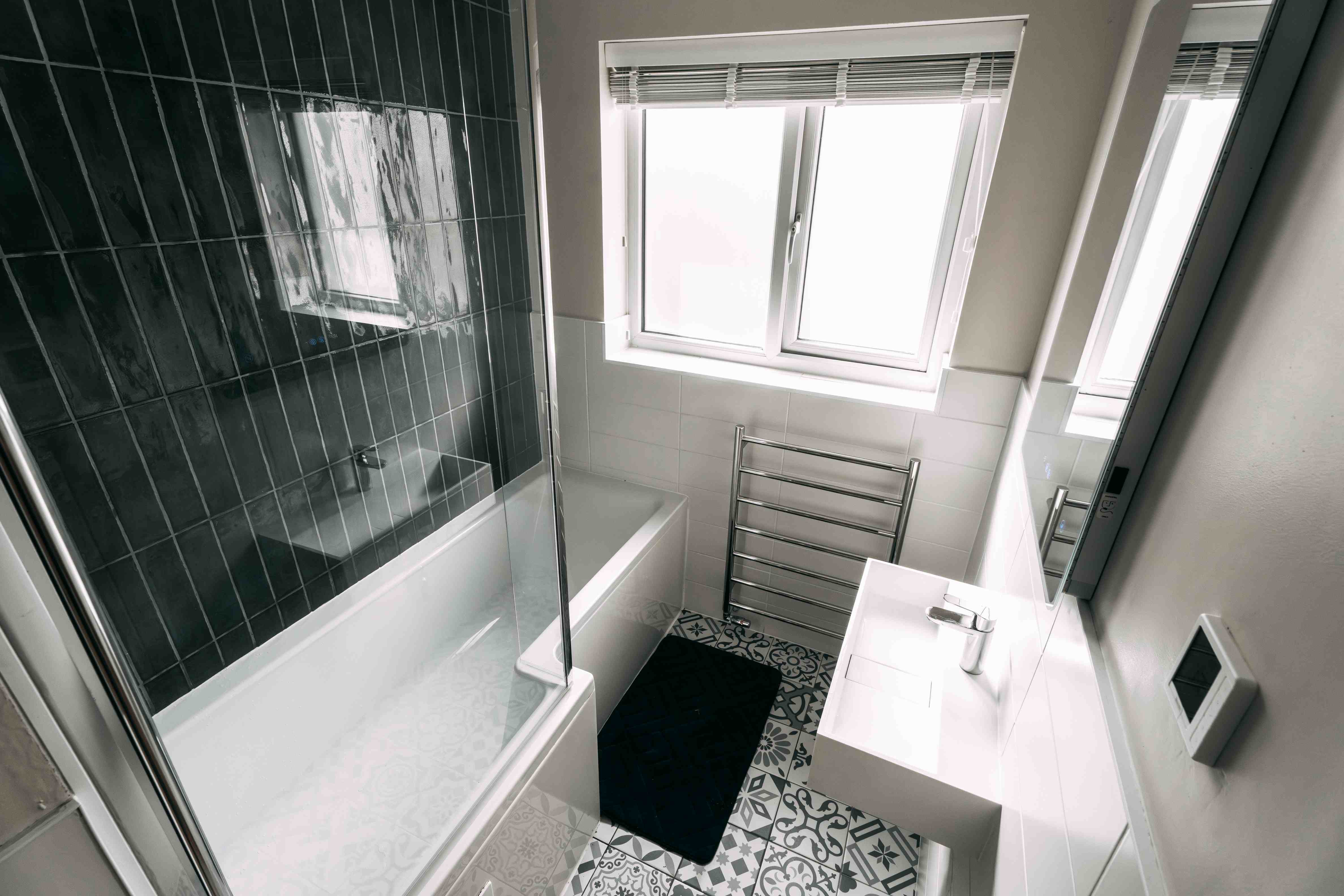Monochrome bathroom, angled overhead full layout