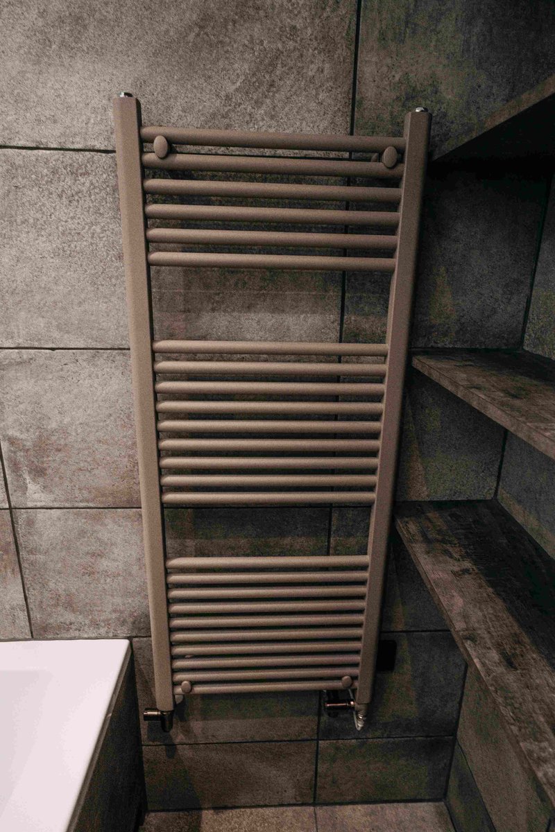Taupe matt heated towel rail with open shelving